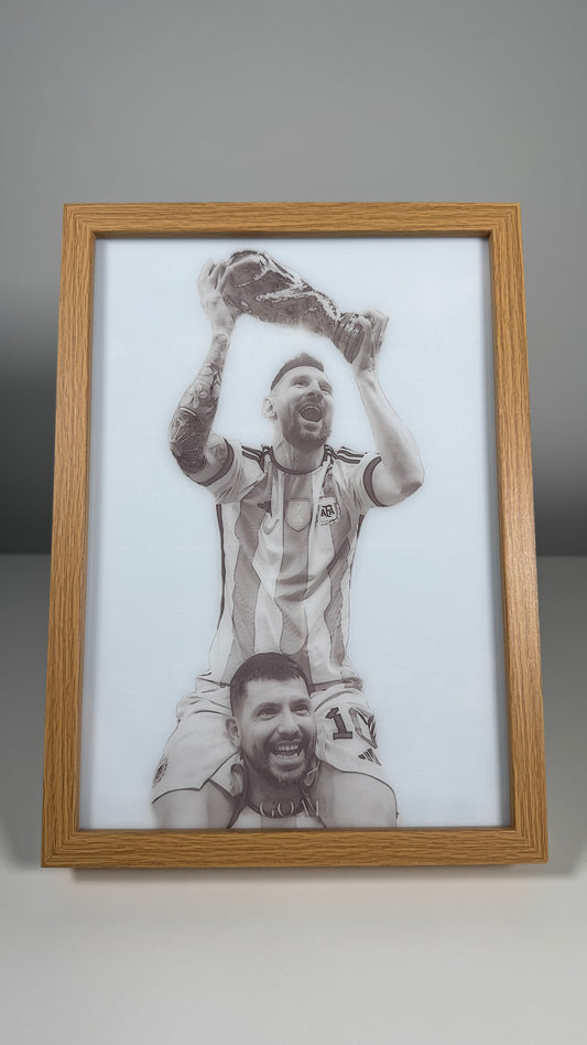 Messi lifting the World Cup Frame
